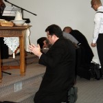 Praying at the alter